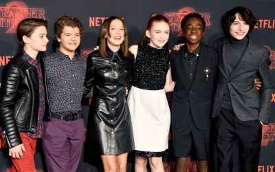 Stranger Things kids get together to wrap presents